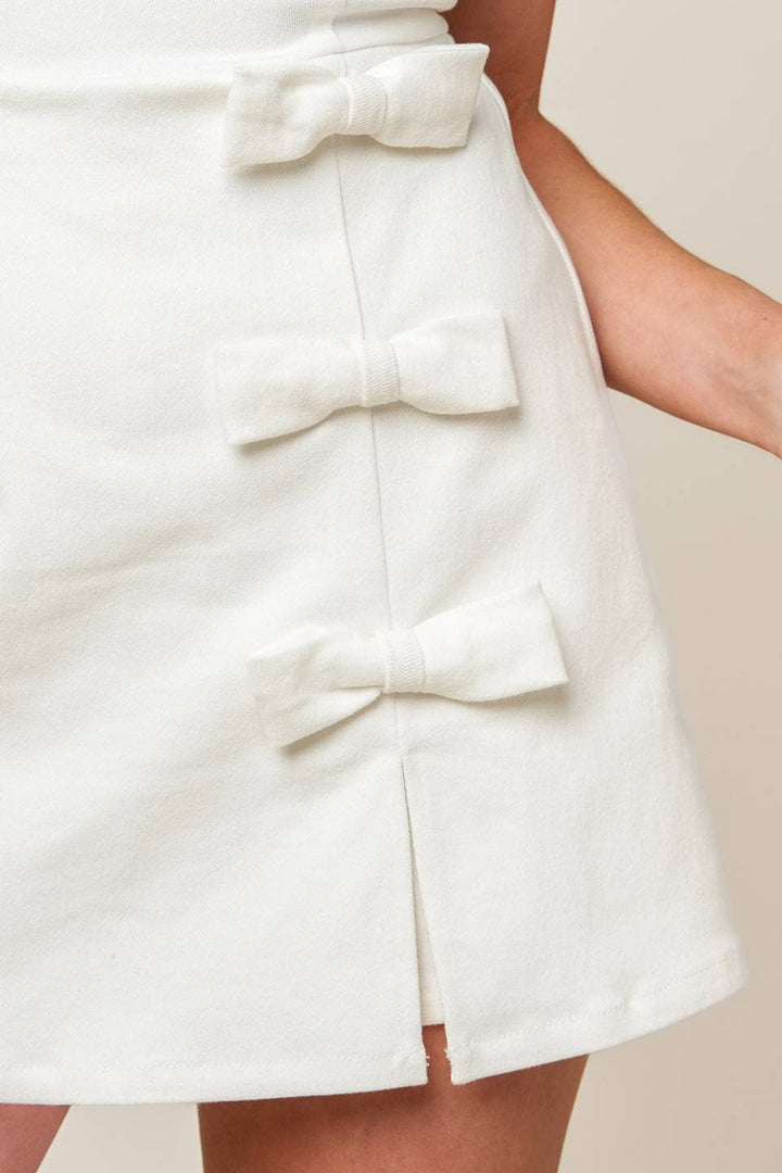CAL JUNE The Lucienne Romper in White
