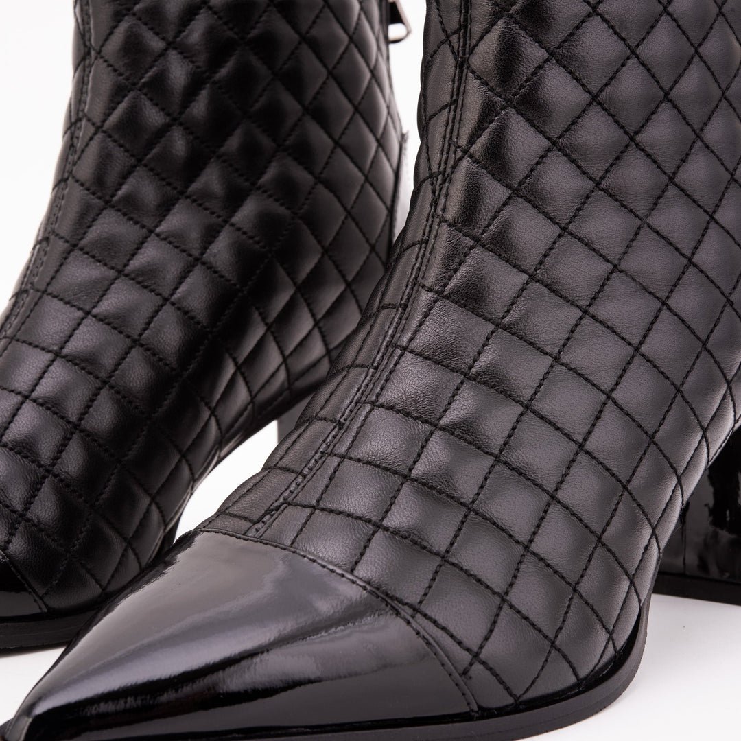 The Celeste Black Tip Quilted Leather Women’s Boot