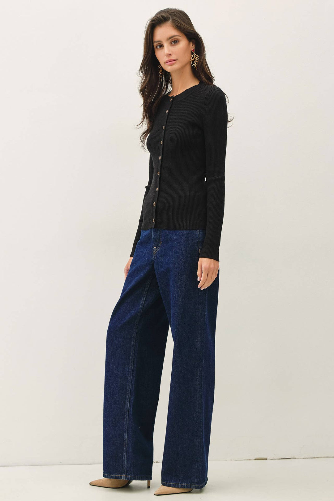 CAL JUNE slim-fit black ribbed cardigan with crew neckline and button-front closure worn with wide-leg jeans