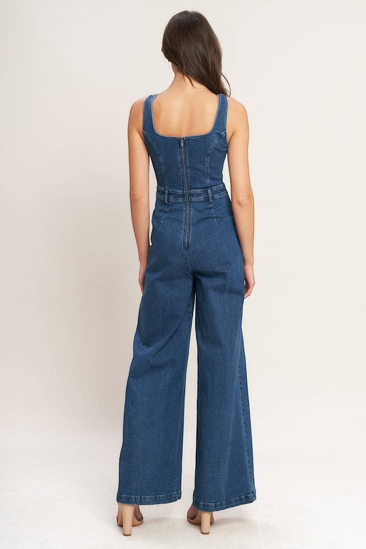 CAL JUNE Ari Denim Jumpsuit, a sleeveless, wide-leg jumpsuit with a square neckline and back zipper closure.