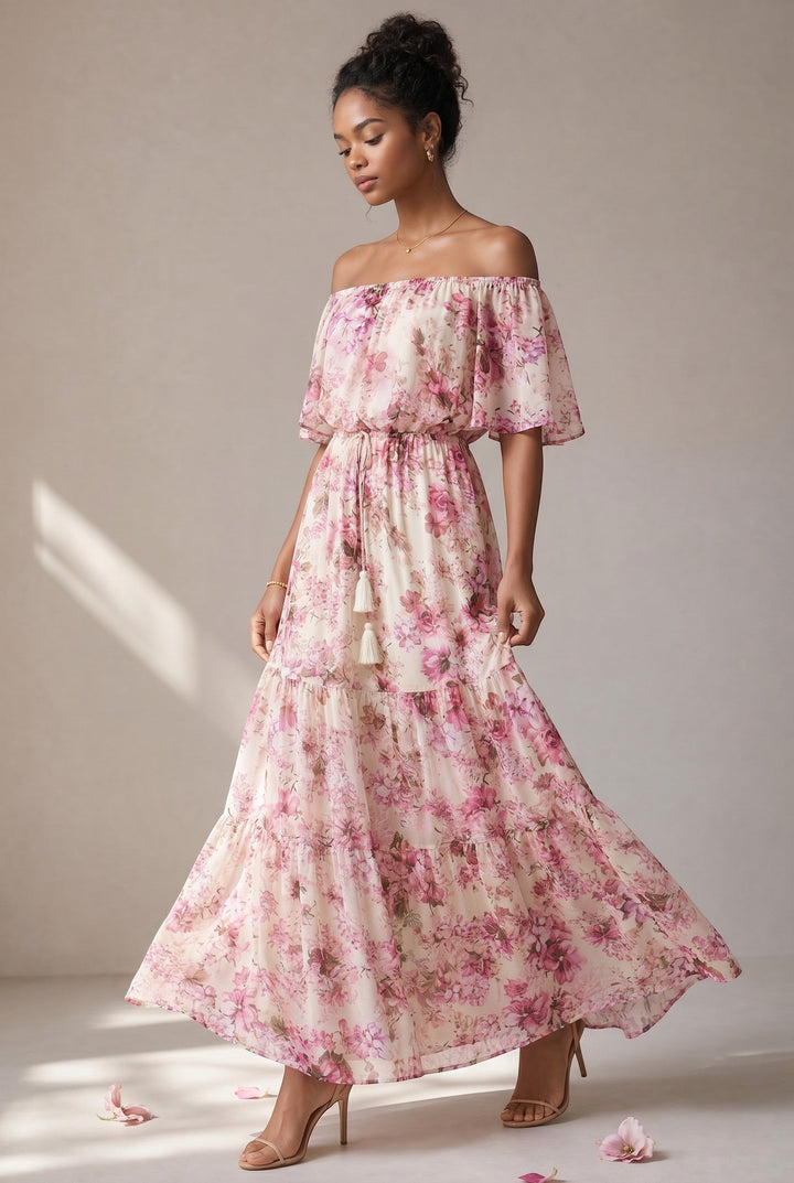 CAL JUNE Arielle off-shoulder floral maxi dress in pink and purple on cream with tiered skirt and tassel drawstring.