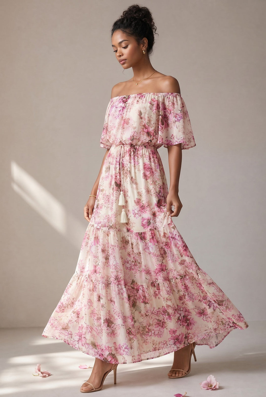 CAL JUNE Arielle off-shoulder floral maxi dress in pink and purple on cream with tiered skirt and tassel drawstring.