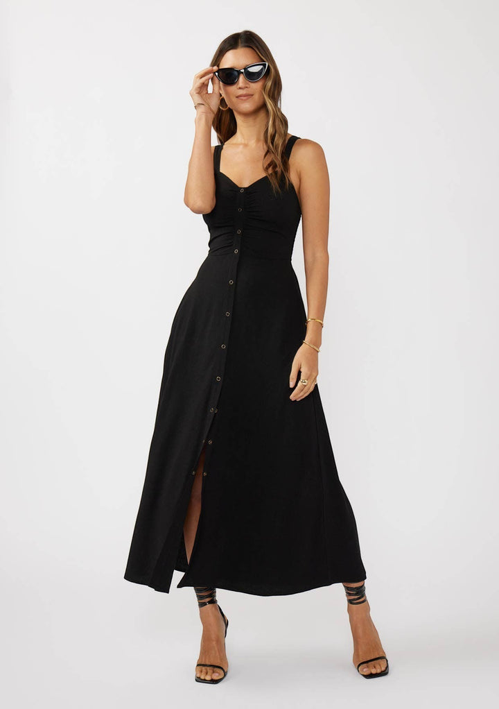 CAL JUNE black button-front maxi dress with ruched bust and thigh-high slit. Model wears size S.
