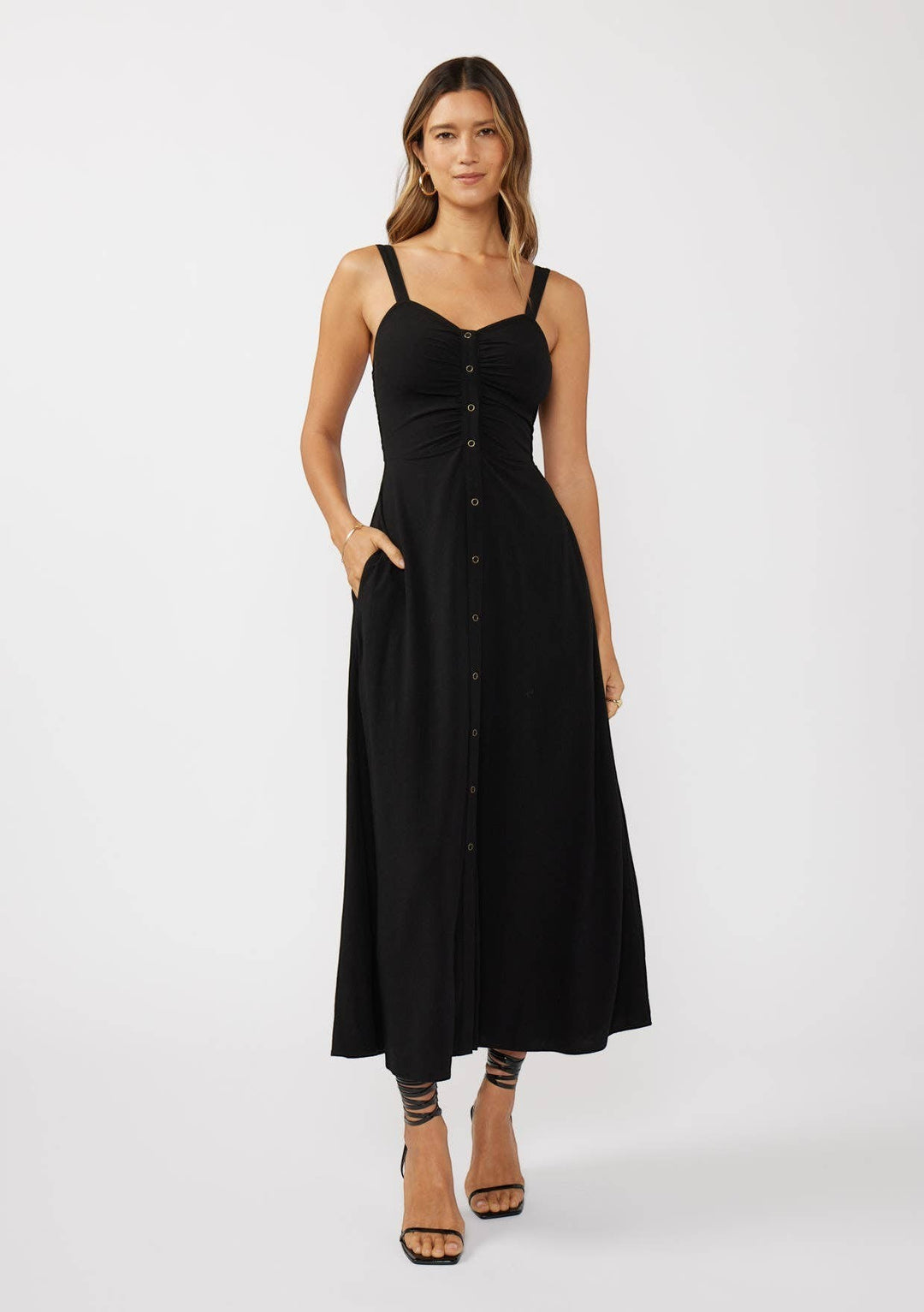 CAL JUNE black button-front maxi dress with ruched bodice and adjustable straps. Model is wearing size Small.