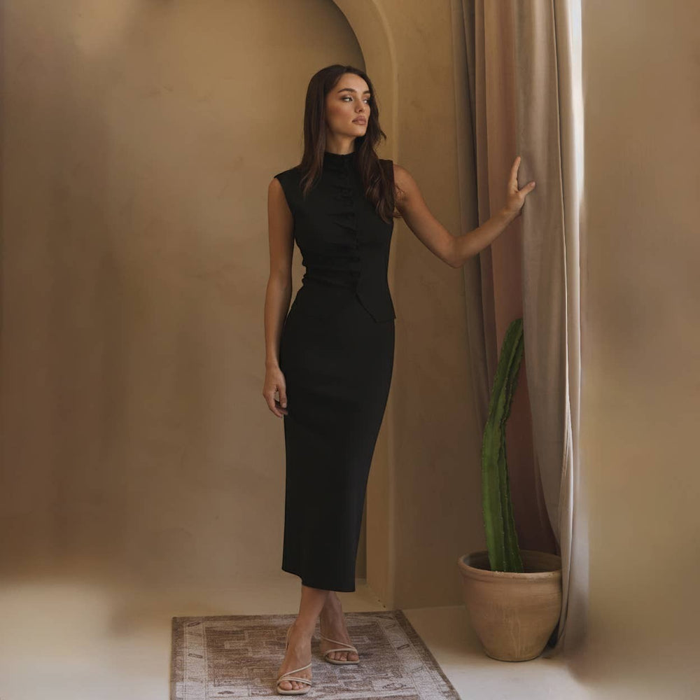 CAL JUNE black sleeveless mock neck knit top with button detail and matching midi skirt