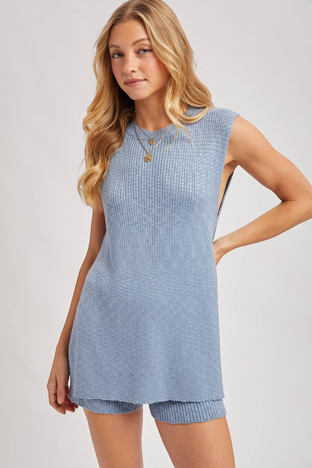 CAL JUNE blue rib knit sleeveless crew neck top with side slits and matching high-waisted shorts.