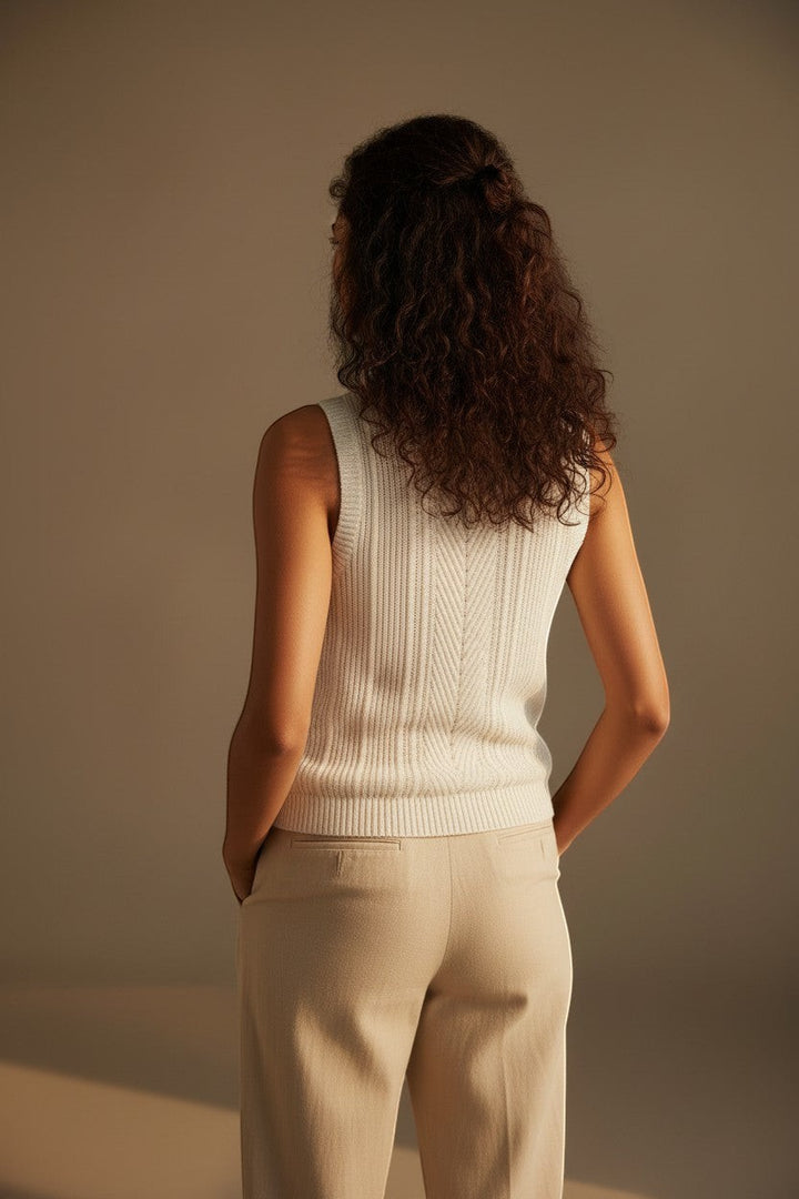 CAL JUNE The Celine Camisole Top, a cream knit sleeveless top with ribbed texture and chevron detail.