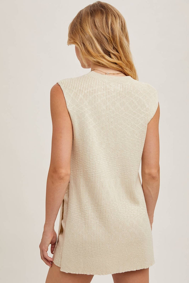 CAL JUNE cream ribbed knit sleeveless midi dress with a relaxed fit and side slit detail.