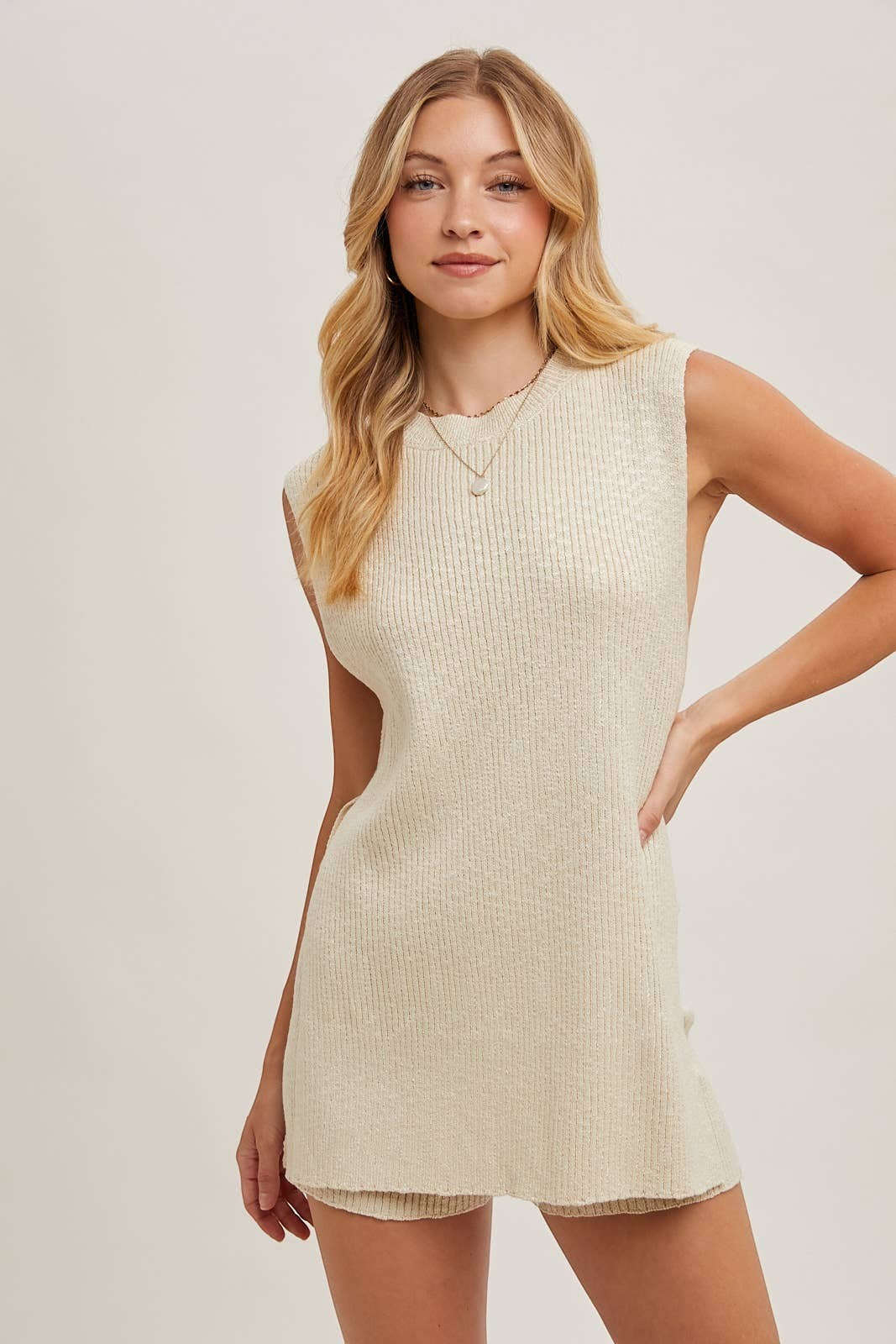 CAL JUNE cream ribbed knit sleeveless lounge set with matching shorts. Model wearing size Small.