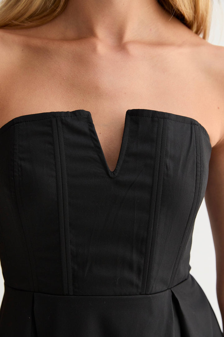 CAL JUNE Elara Strapless Midi Dress in black, featuring a sculpted bodice with boning and a V-wire neckline. Midi length.
