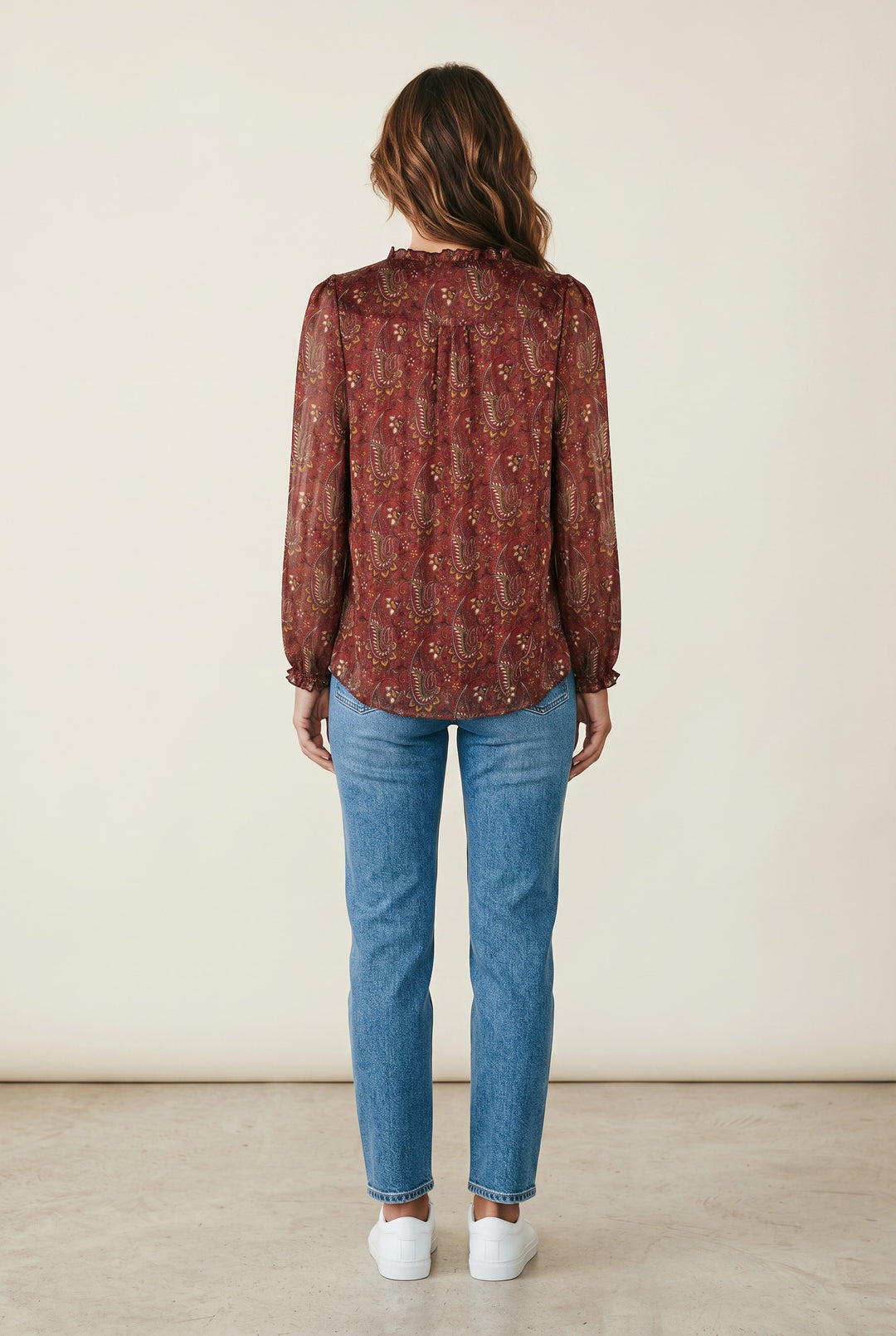CAL JUNE The Elizabeth Ruffle Blouse, red paisley print sheer long sleeve blouse with ruffled neckline and cuffs.