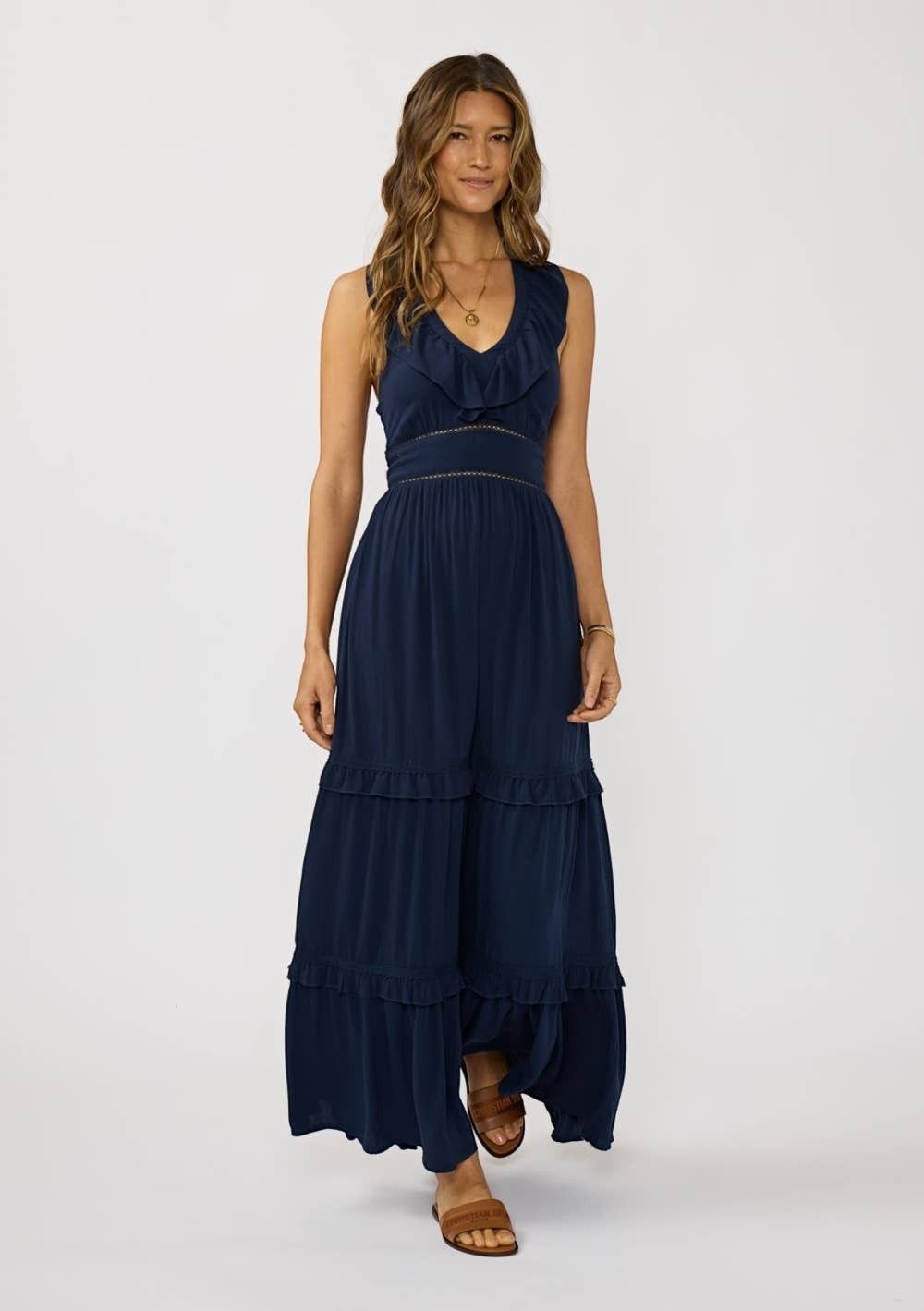 CAL JUNE navy blue tiered ruffle maxi dress with V-neckline and lace waist detail. Sleeveless, flowing fabric.