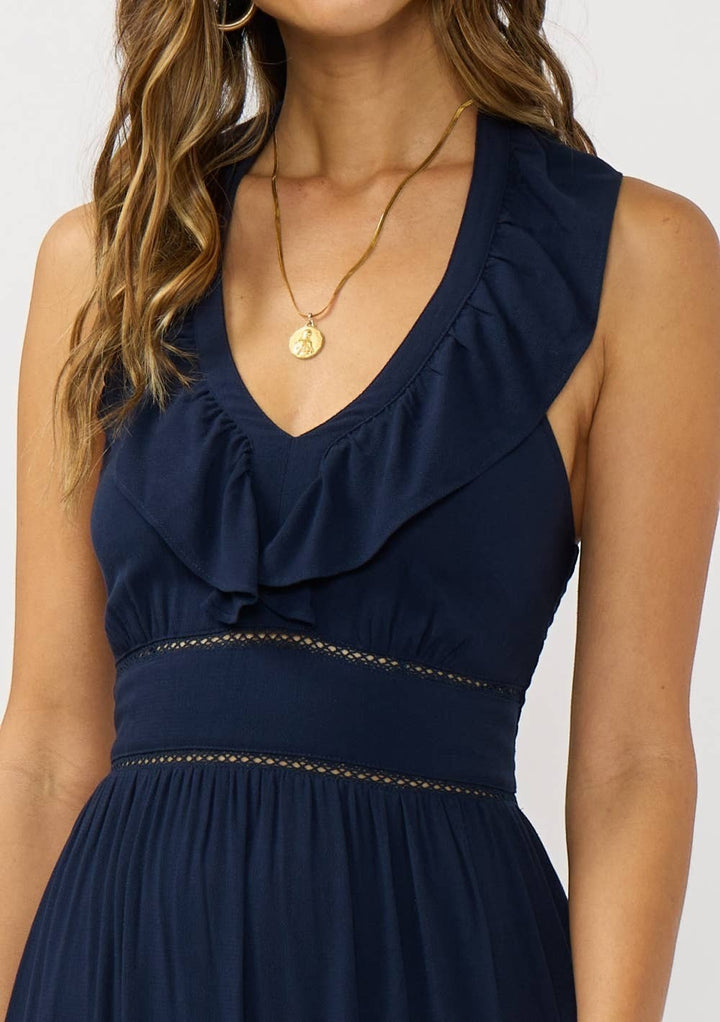 CAL JUNE navy blue V-neck maxi dress with tiered ruffles and lace waist cutout detail.