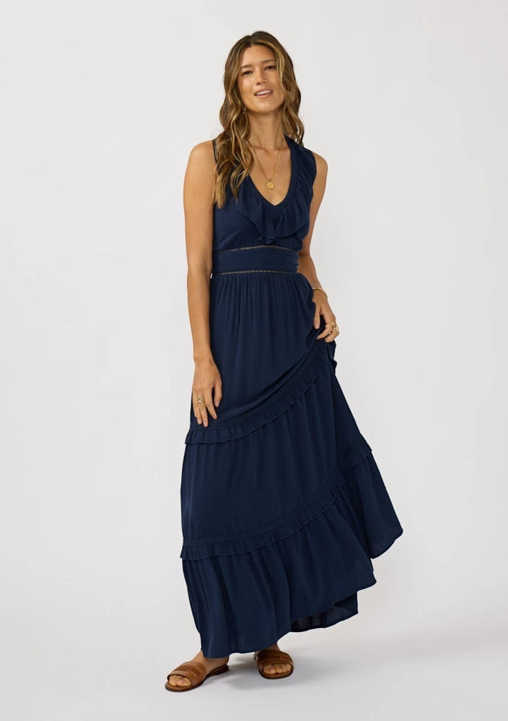CAL JUNE navy blue V-neck tiered ruffle maxi dress with lace waist detail and sleeveless design.