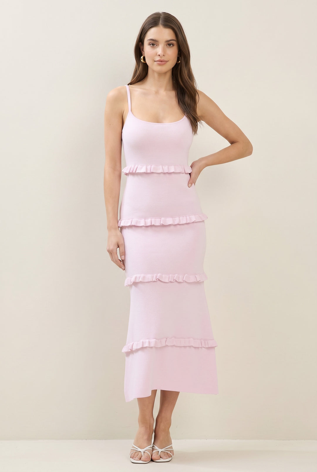 CAL JUNE blush pink knit tiered midi dress with spaghetti straps and ruffle details. Fitted bodice, flowing skirt.