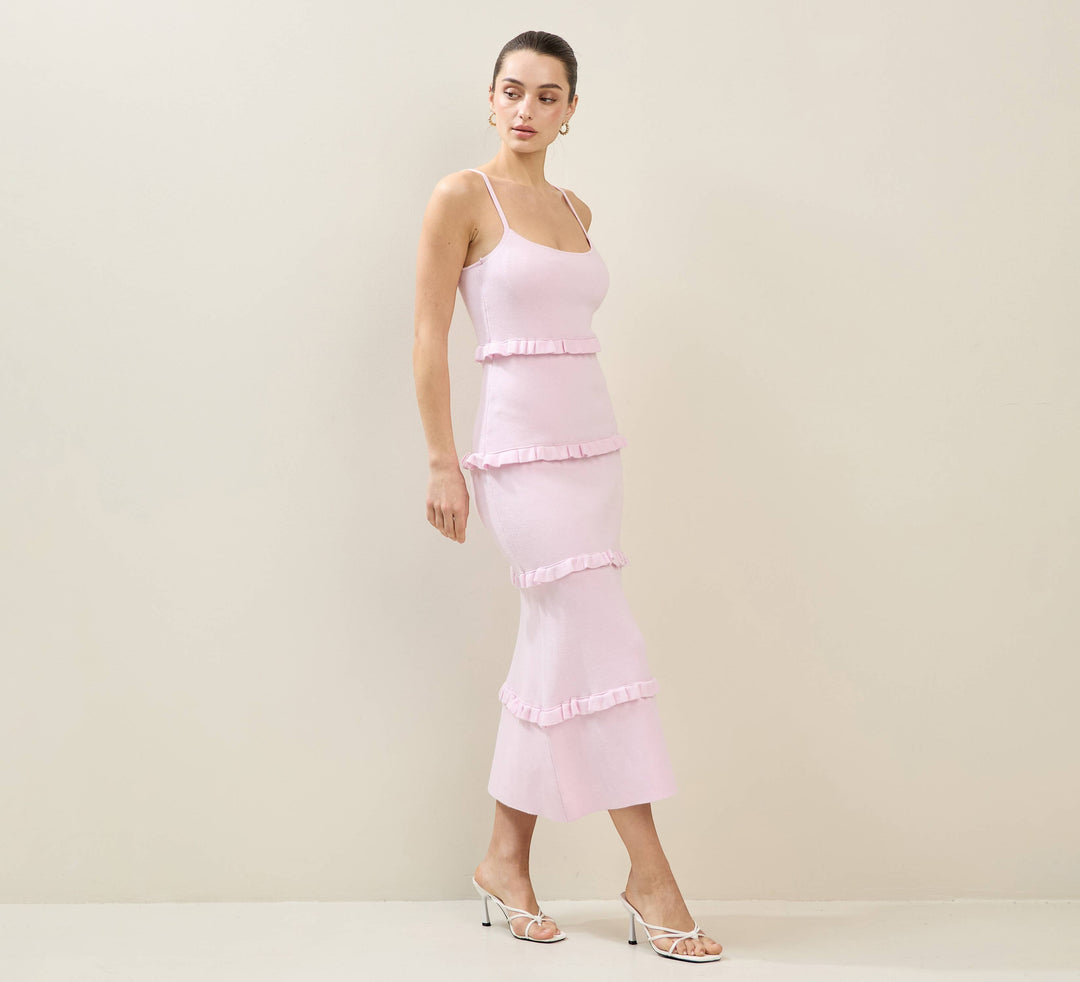 CAL JUNE light pink tiered maxi dress with spaghetti straps and ruffled detailing. Model wears size S.
