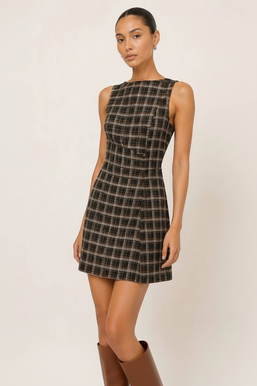 Model wearing a CAL JUNE sleeveless brown and black plaid mini dress with a tailored silhouette and high neckline.