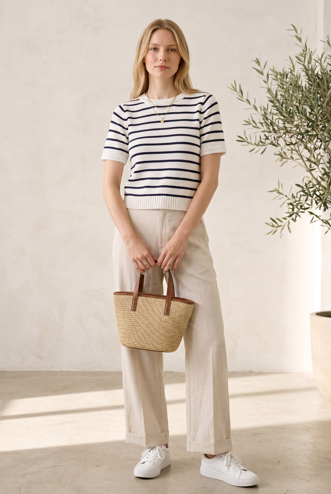 CAL JUNE white and navy striped short-sleeve knit top, 100% cotton, with subtle eyelet detail on sleeves.