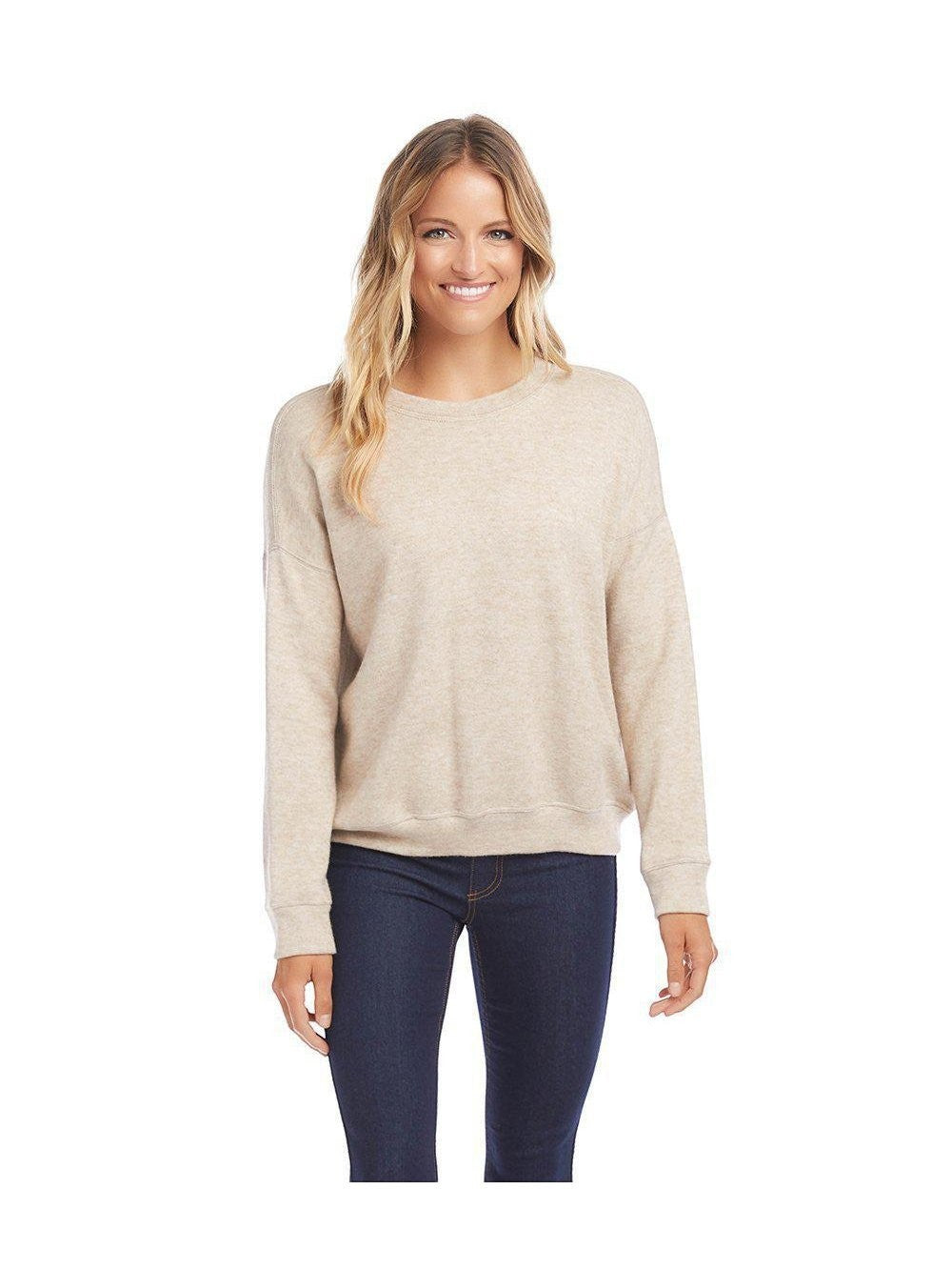 CAL JUNE The Tessie Sweater Knit Top in beige, a versatile crewneck with a relaxed fit, styled with dark wash jeans.
