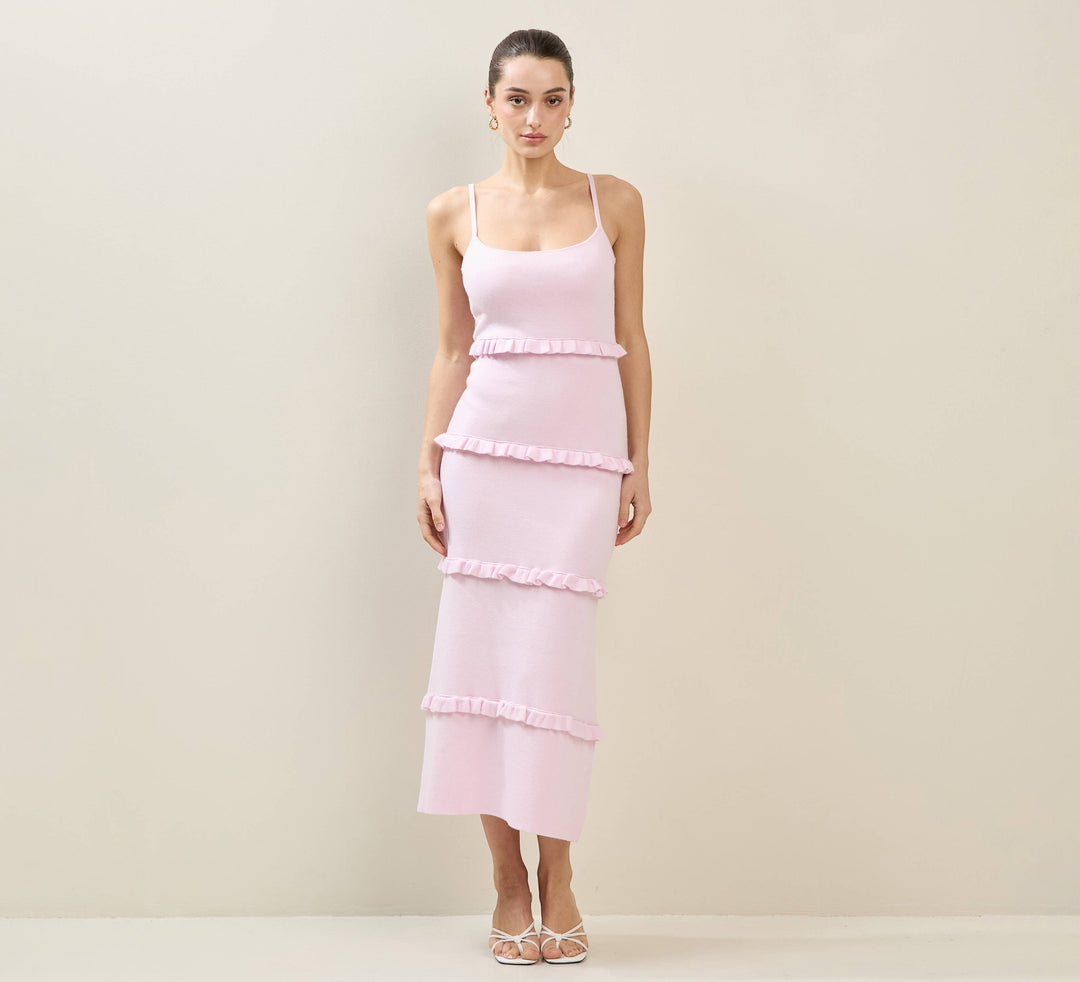 CAL JUNE light pink tiered maxi dress with spaghetti straps and ruffled detailing. Model wears size S.