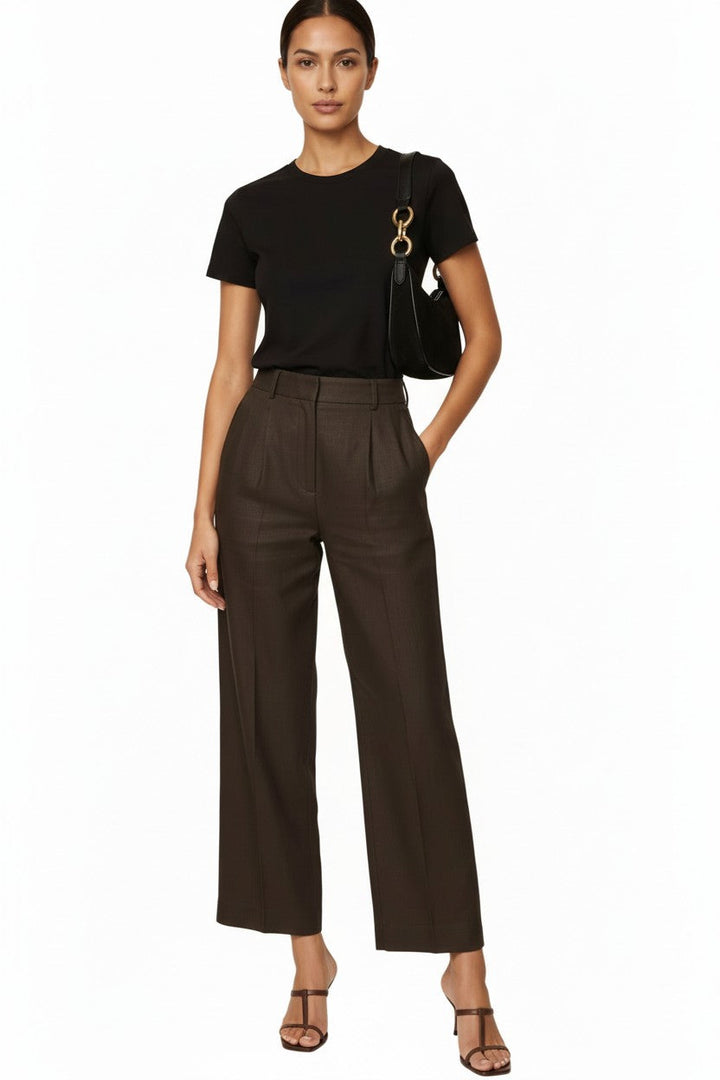 Model wearing CAL JUNE heather-choco wide-leg tailored pants with front darts and a black t-shirt.