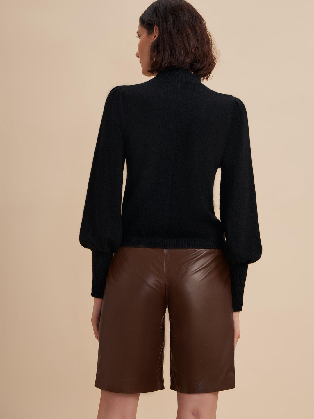 black puff-sleeve knit top for women