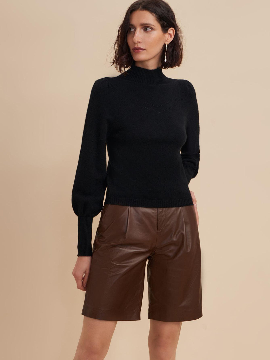 black puff-sleeve knit top for women